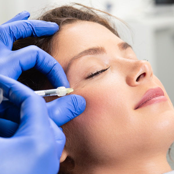 woman receiving botox injections