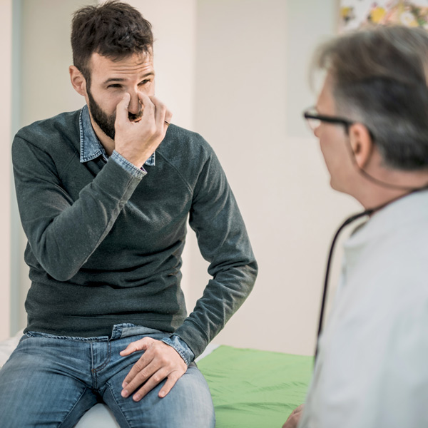 patient expressing concern with nose to doctor