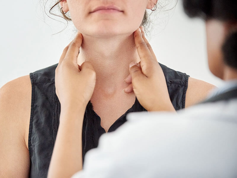 woman being examined by doctor