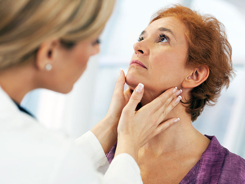 woman being examined by doctor
