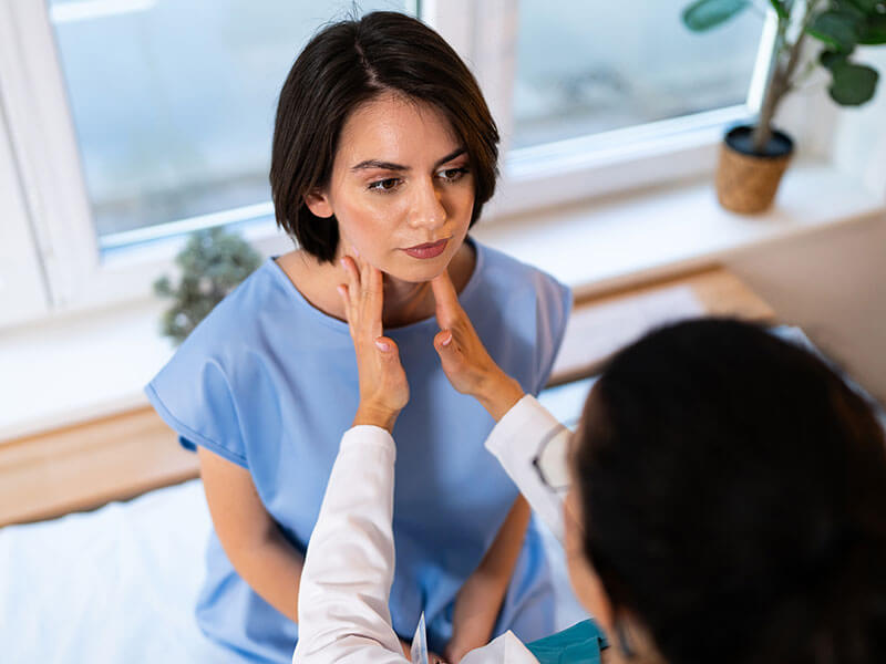 woman being examined by doctor
