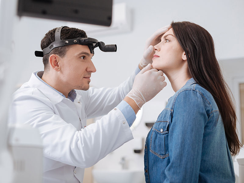 woman being examined by doctor